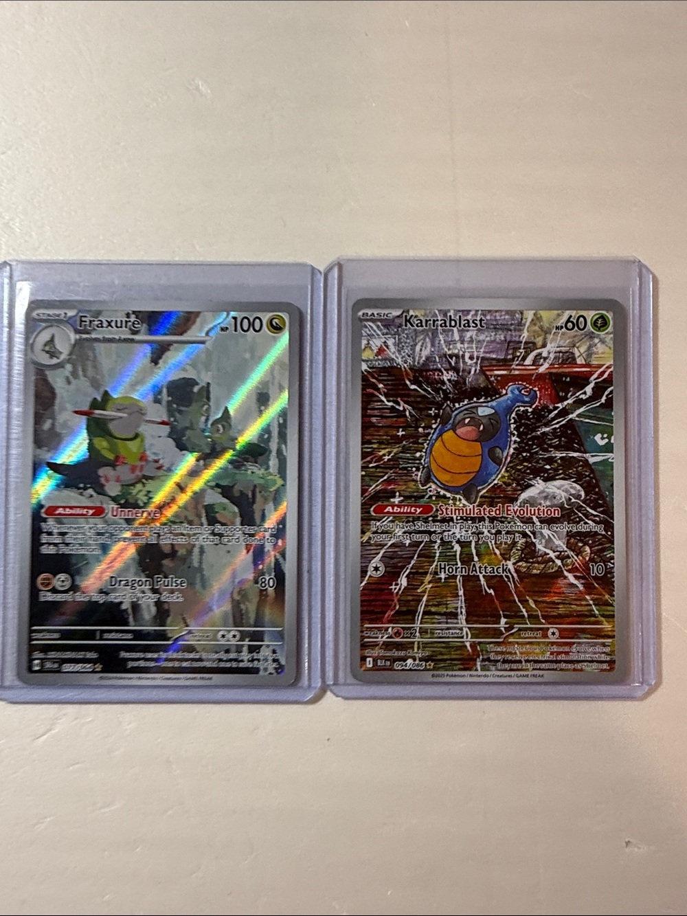 Pokemon Holographic Fraxure & Karrablast Cards - Silver and Multicolor